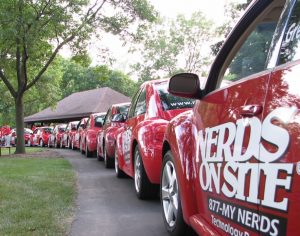 Nerds on Site logo on cars