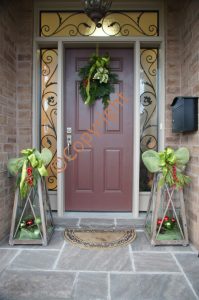 Photo of red door with greenery