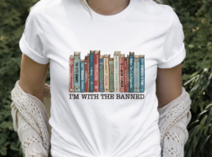 T-shirt with an image of a row of books. Text reads, "I'm with the banned."