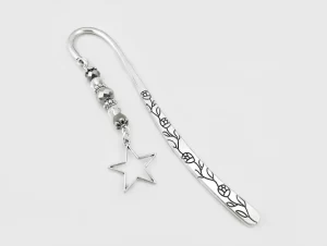 Silver bookmark with a dangling heart