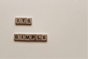 Scrabble tiles spell out: It's simple.